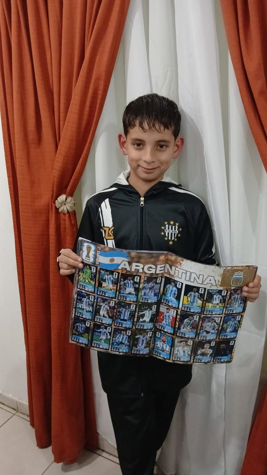 Cliente El Coleccionista con álbum Panini en Villa María